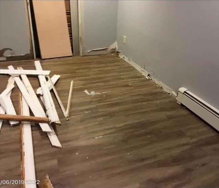 Damaged floor and drywall