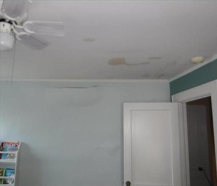 Storm damage ceiling before work