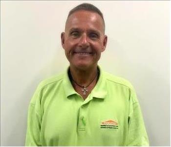 Picture of Bob Morrison wearing a green shirt