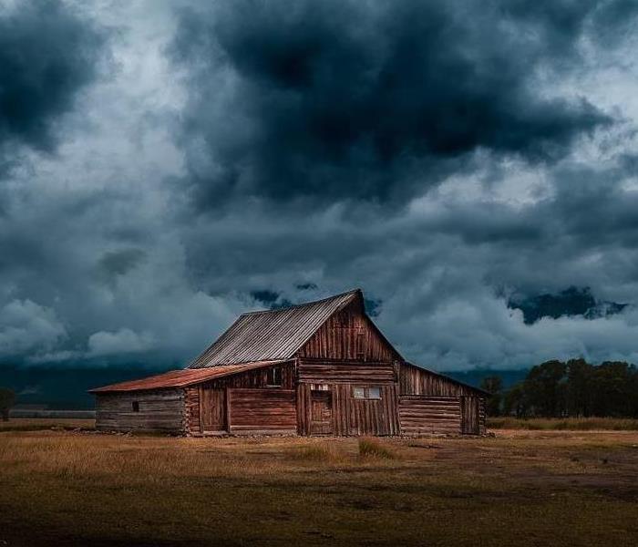 House and storm clouds. 